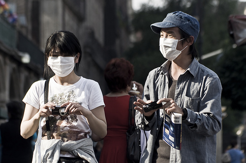 Turistas en época de la gripe porcina