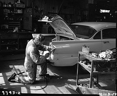 A mechanic in a garage in 1959.