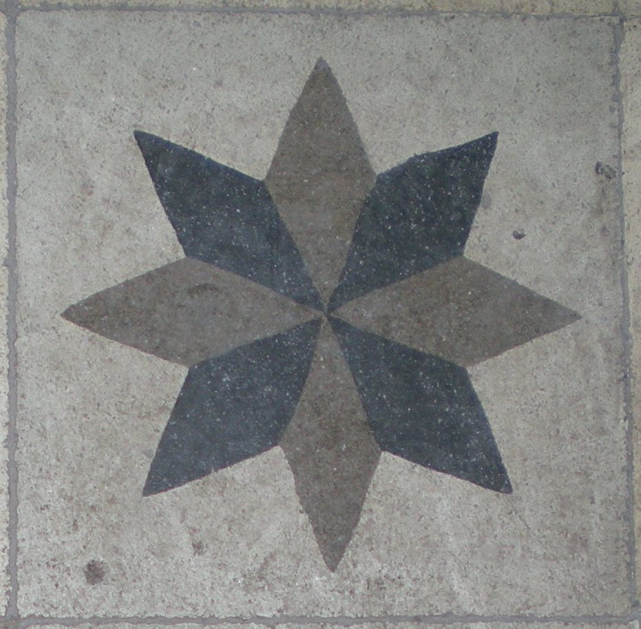 Estrella en pavimento, realizada en Málaga.